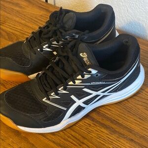 Asics Black and White Athletic Shoes with Sporty Silhouette